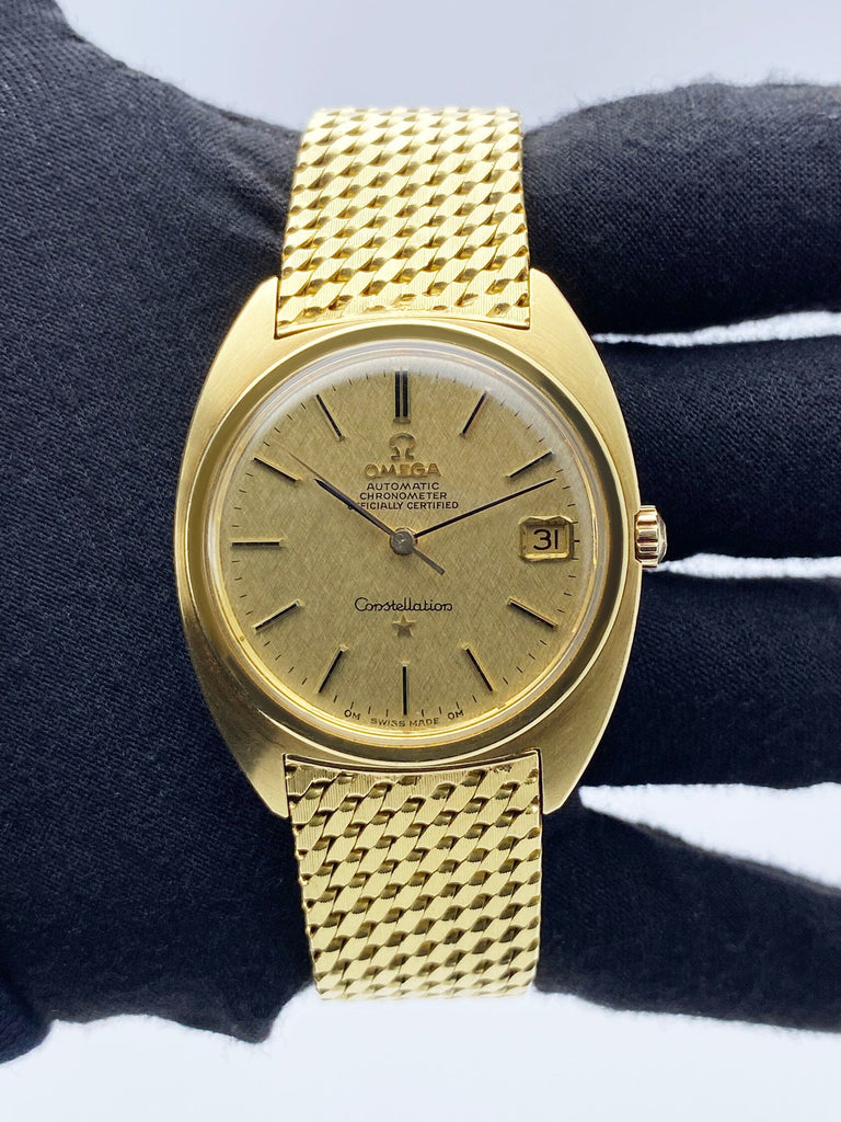 Omega constellation mens gold best sale