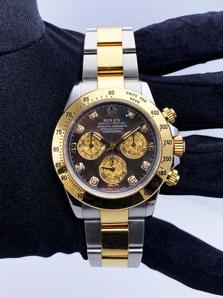 Rolex daytona gold on sale crystal